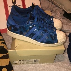 A BATHING APE® x UNDEFEATED x adidas SUPERSTAR 80v